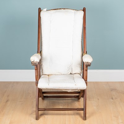 Lot 467 - A teak-framed Campaign chair