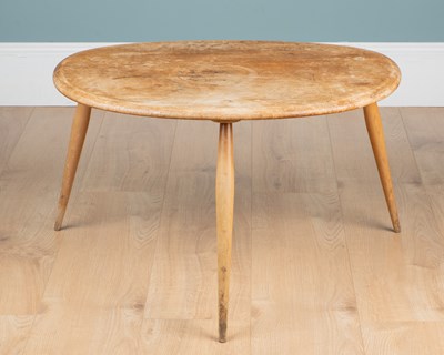 Lot 154 - An Ercol elm-topped 'Pebble' occasional table