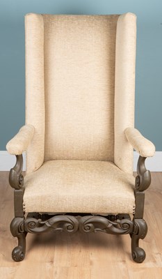 Lot 1105 - A Carolean-style wingback armchair