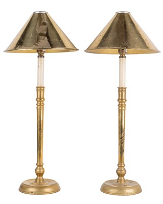 Lot 182 - A pair of French brass table lamps