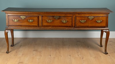 Lot 1016 - A George III oak dresser