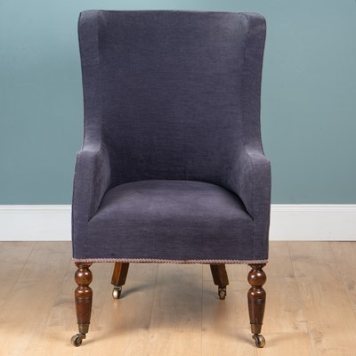 Lot 550 - A 19th century mahogany-framed wingback armchair