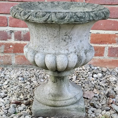 Lot 1434 - A cast composite urn