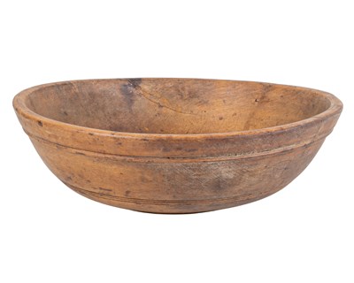 Lot 1023 - A treen turned sycamore dairy bowl