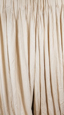 Lot 130 - A pair of cream, lined curtains