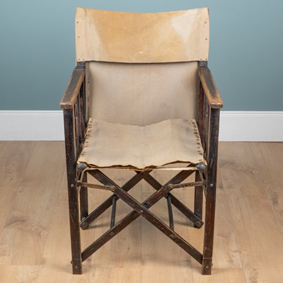 Lot 1439 - An Arts & Crafts-style campaign chair