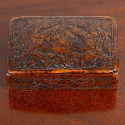 Lot 1046 - A Georgian carved walnut table snuff box