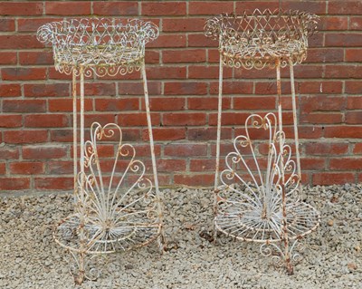 Lot 1443 - A pair of wirework plant stands