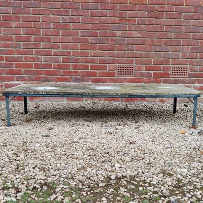 Lot 1455 - A low marble-topped garden table and a wooden stepladder