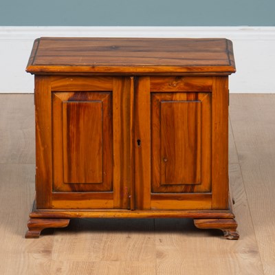 Lot 1057 - A yew wood tabletop cabinet
