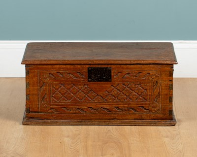 Lot 1100 - A small antique oak coffer