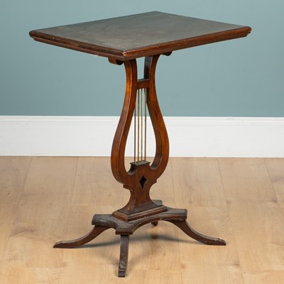 Lot 419 - A mahogany occasional table