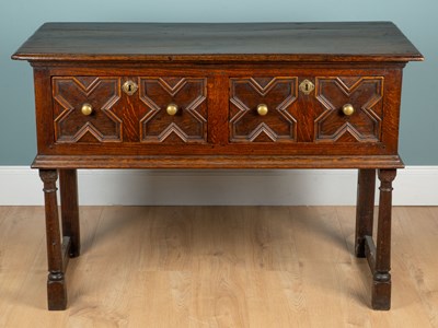Lot 1090 - An 18th century oak dresser