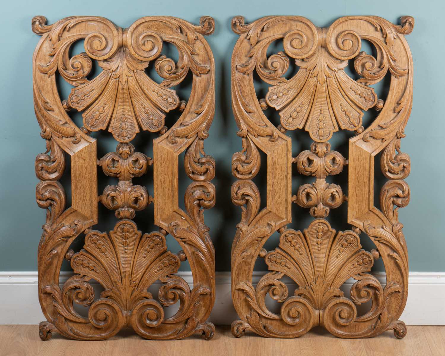 Lot 1013 - A pair of antique carved oak panels