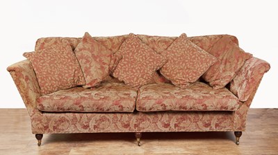 Lot 57 - In the Howard style Sofa, with rust and gold...