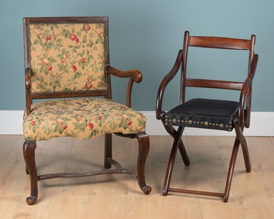Lot 1085 - A metamorphic campaign chair, together with a French elbow chair