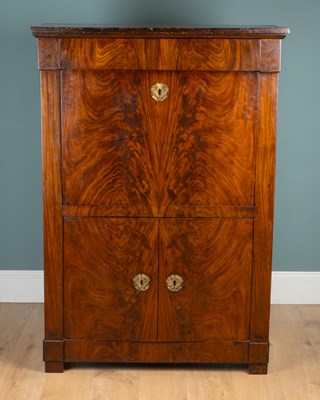 Lot 69 - A 19th century Empire secrétaire à abattant with mahogany flame veneer