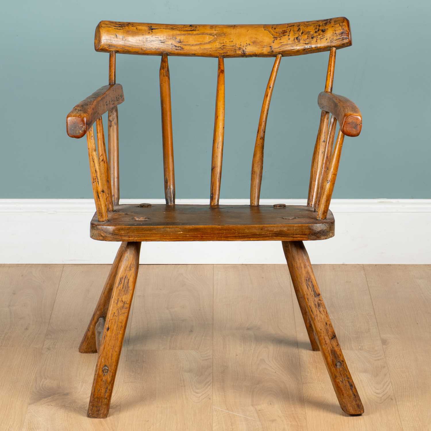 Lot 1145 - A rustic Irish ash and elm hedgerow chair