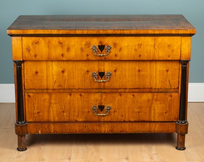 Lot 46 - A Biedermeier satinwood commode