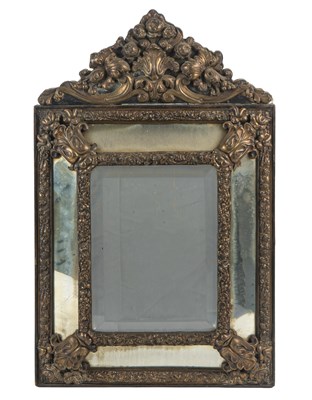 Lot 65 - A Venetian cushion-framed mirror