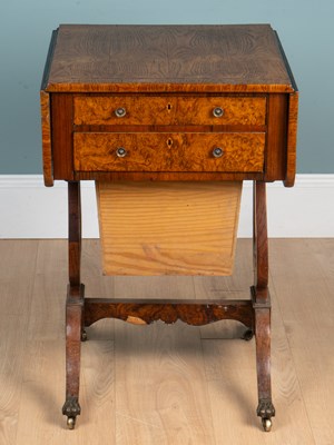 Lot 1011 - An elm and burr wood veneered work table