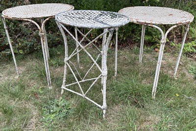 Lot 1030 - Three white-painted wirework garden occasional tables