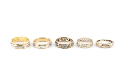 Lot 424 - A diamond set band ring, 18ct two colour gold...