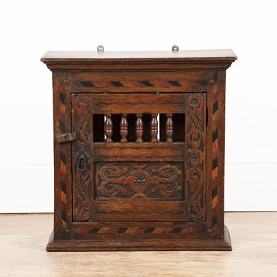 Lot 36 - Oak and inlaid wall cupboard 17th Century...