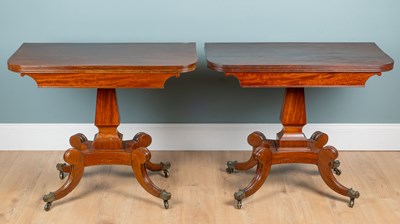 Lot 1372 - A pair of Regency mahogany fold-over tea tables