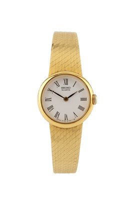 Lot 299 - A lady's 9ct gold bracelet watch by Seiko, the...