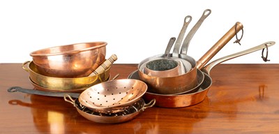 Lot 1120 - A collection of copper and brass kitchenware