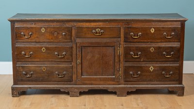 Lot 62 - A George III oak dresser