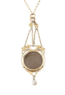 Lot 251 - An Arts and Crafts locket pendant by Murrle...