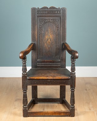 Lot 1156 - A 17th century oak and elm Wainscot chair