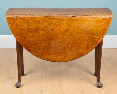 Lot 1209 - An 18th century burr walnut drop-leaf table