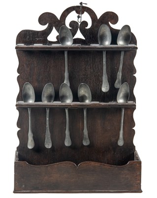 Lot 1039 - An 18th century oak spoon rack