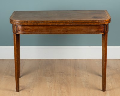Lot 1331 - An 19th century mahogany fold-over card table