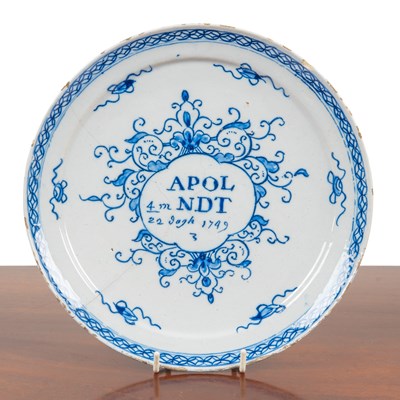 Lot 1110 - A rare Dutch Delft marriage plate