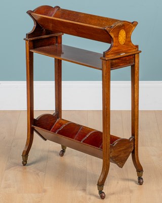 Lot 535 - An Edwardian mahogany book trough on stand by Asprey & Co Limited