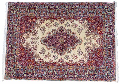 Lot 1028 - A late 20th century Kerman-style rug