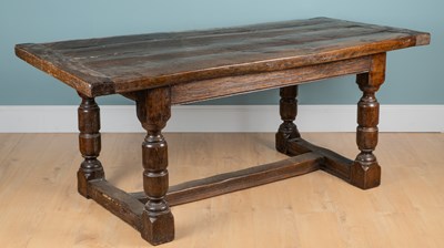 Lot 1045 - An 18th century oak refectory table