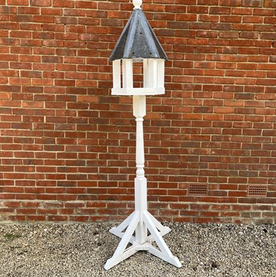 Lot 1410 - A white-painted bird table