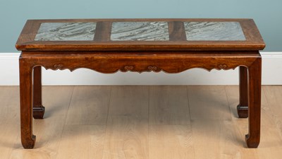 Lot 311 - An antique Chinese hardwood low occasional table