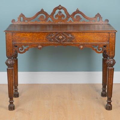 Lot 1042 - A Victorian oak Aesthetic Movement serving table
