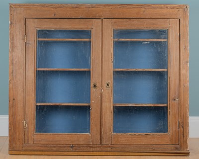 Lot 1163 - A 19th century pine hanging cupboard