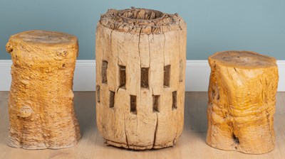 Lot 1254 - An elm wheel hub, together with a pair of resin occasional tables