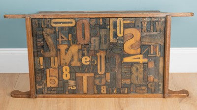 Lot 134 - A coffee table converted from a dough bin
