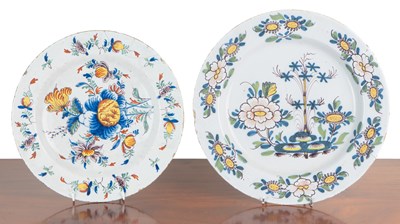 Lot 1059 - Two 18th century English Delft chargers