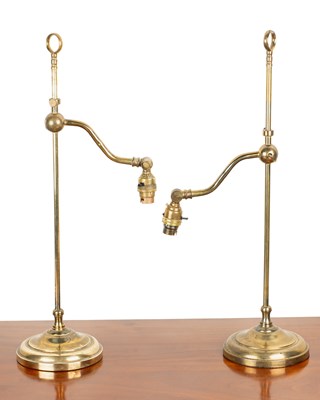 Lot 183 - A pair of adjustable brass table lamps