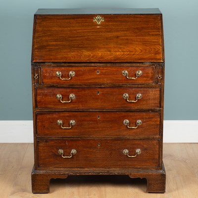 Lot 1296 - A 19th century mahogany bureau
